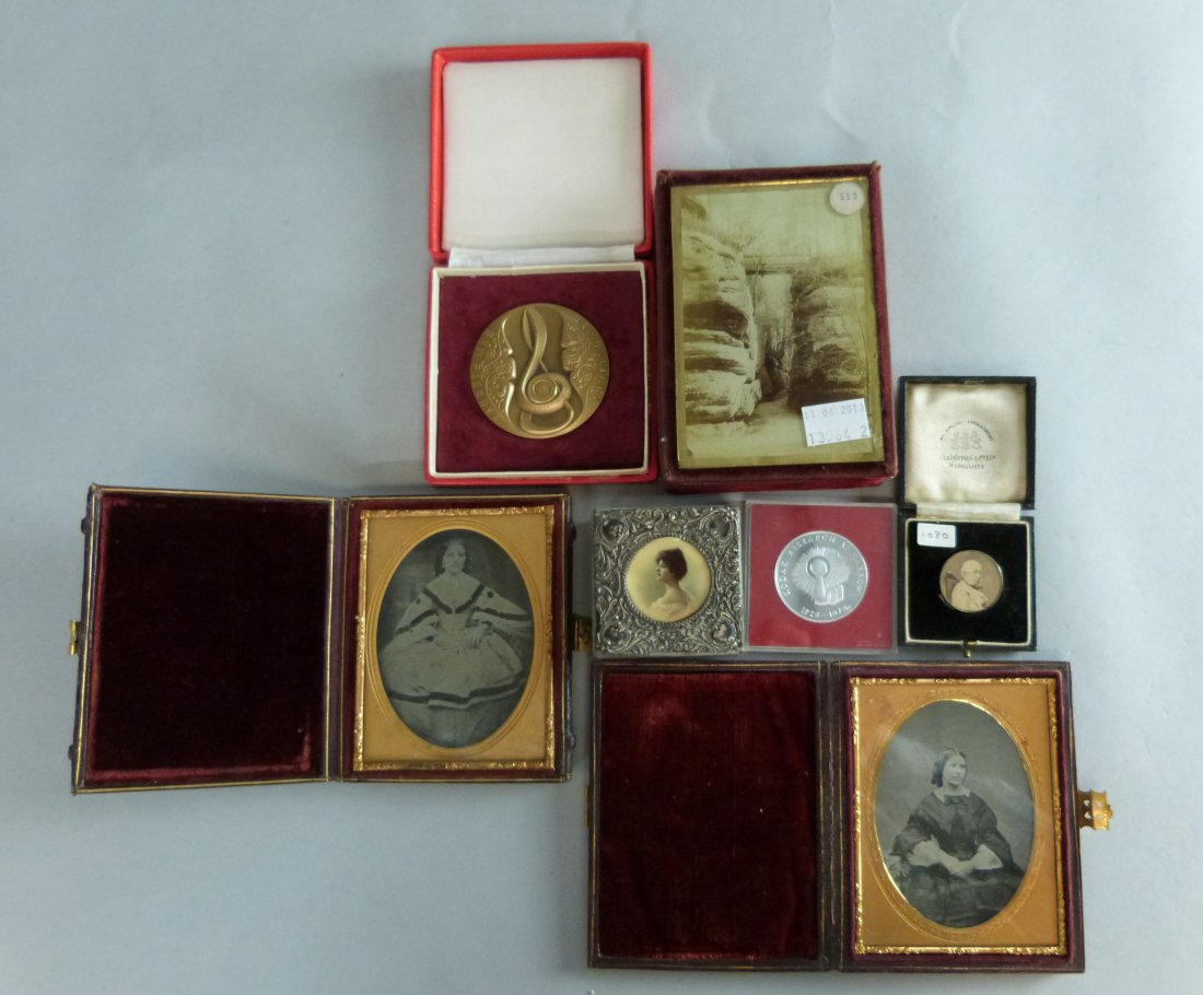 19th century potrait ambrotype photograph of a young: 19th century potrait ambrotype photograph of a young women highlighted in gilt in folding leather case silver topped box inset with photograph, a miniature photograph in round silver plated frame, bro