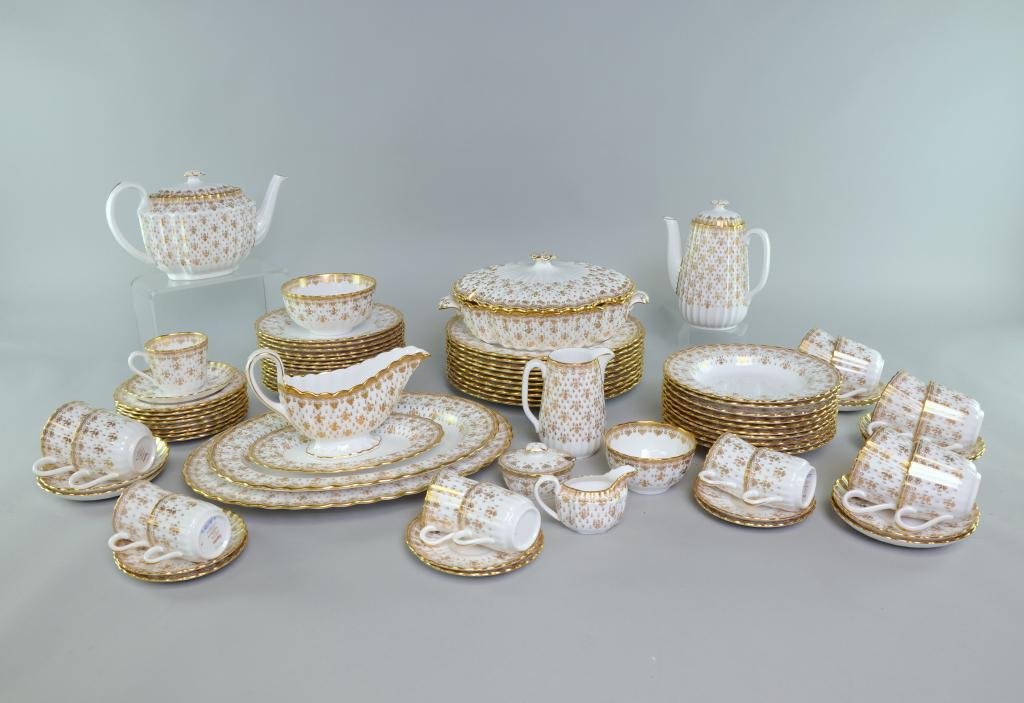 Spode Fleur de Lys dinner service Comprising; Ten 10": Spode Fleur de Lys dinner service Comprising; Ten 10" plates Fourteen 8" plates Ten 8" bowls Eight 6" plates Six coffee cans and saucers Nine teacups and saucers Teapot Coffeepot Cream jug Milk jug Tw
