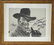 John Wayne, a signed black and white photograph of the