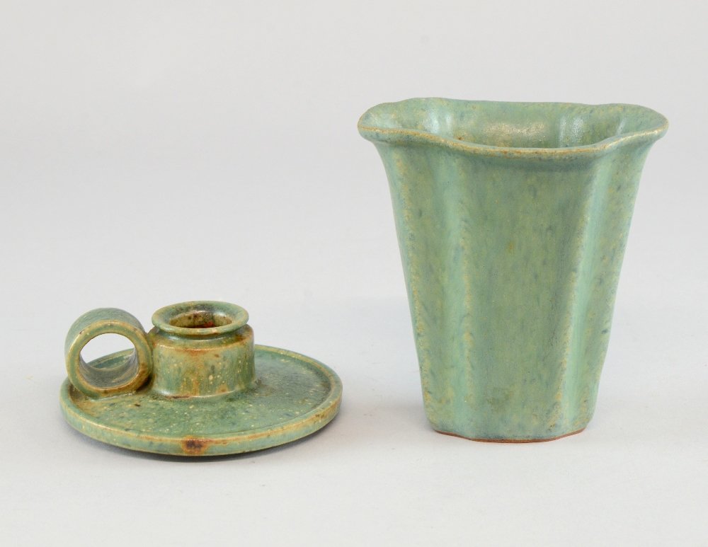 Arne Bang a fluted stoneware vase and candleholder: Arne Bang a fluted stoneware vase and candleholder green glaze both monogrammed and numbered. Arne Bang 1901-1983 Born in Demark he trained as a sculptor at the Academy of Arts. After graduating he wo
