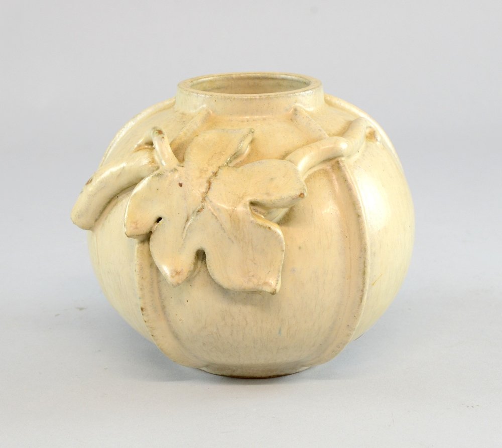 Arne Bang, a large cream glazed organic form vase: Arne Bang, a large cream glazed organic form vase spherical with raised sections and applied decoration of branch and maple leaf, signed and numbered 74. Arne Bang 1901-1983 Born in Demark he trained