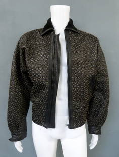 Elton John, a Gianni Versace leather jacket with metal: REVISED ESTIMATE: £1,500-2,500. Elton John, a Gianni Versace leather jacket with metal studs worn & owned by Elton John Provenance: Previously in a Christie's auction September 2008