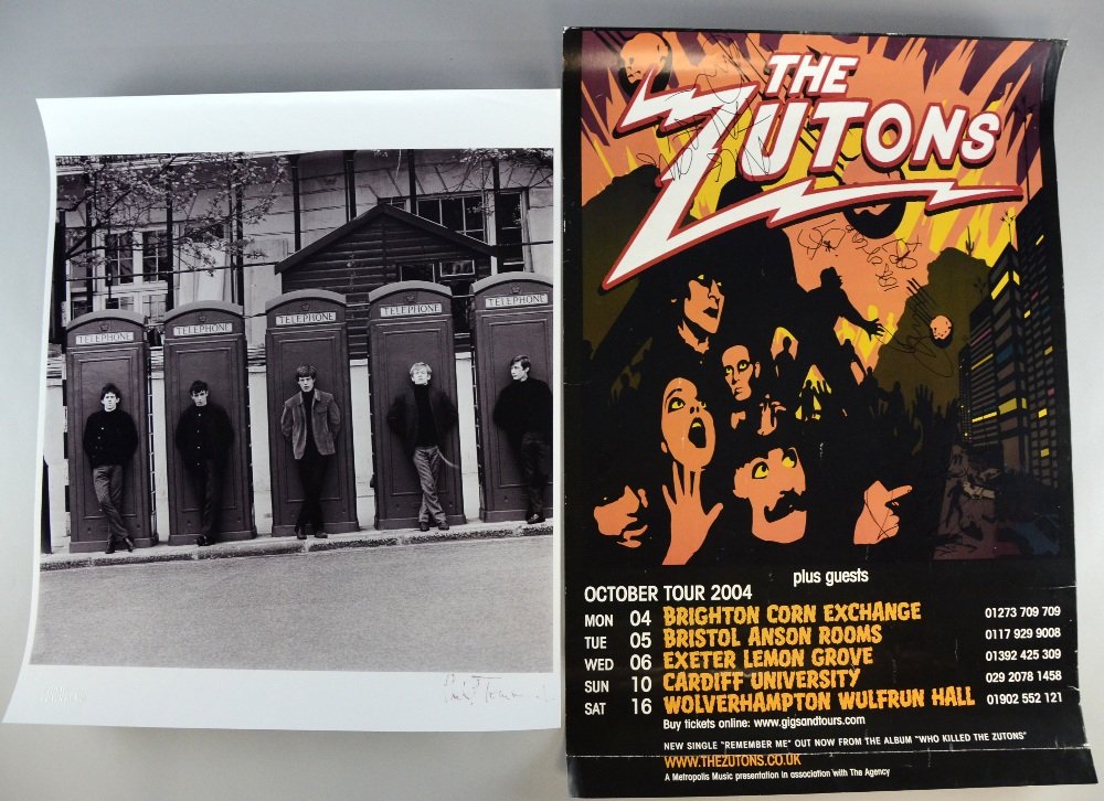 Twelve items of pop memorabilia to include a signed and: Twelve items of pop memorabilia to include a signed and embossed Philip Townsend photograph of The Rolling Stones (20 inch x 24 inch), Full colour tour posters include The Lovin' Spoonful, The Byrds, 