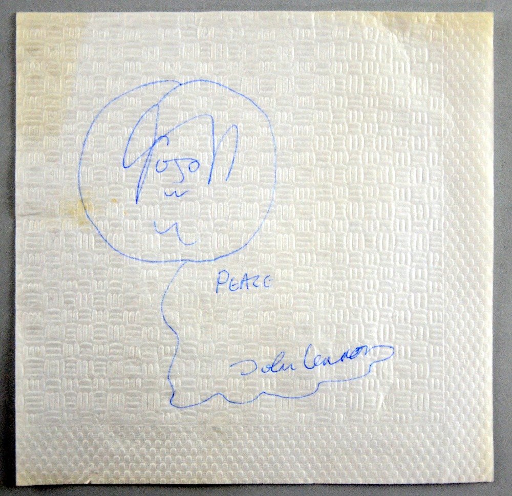 John Lennon, The Beatles, a motorway service centre: John Lennon, The Beatles, a motorway service centre napkin, signed 'Peace John Lennon' with a sketch in typical Lennon style Provenance: This was purchased in the 1990's from a gentleman who met Lenno