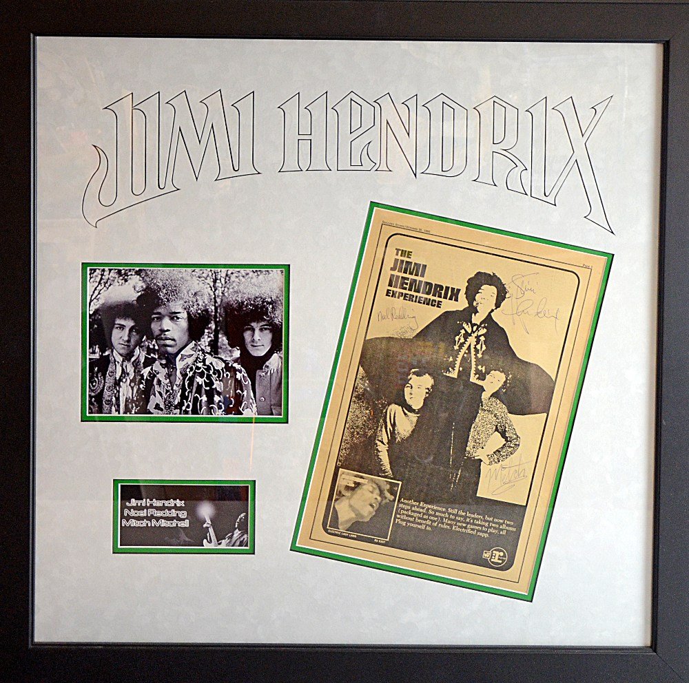 The Jimi Hendrix Experience, Page 5 from Rolling Stone: The Jimi Hendrix Experience, Page 5 from Rolling Stone Magazine dated October 26, 1968 signed in biro by Jimi Hendrix, Noel Redding & 'Mitch' Mitchell, framed in a presentation display Provenance: Sol