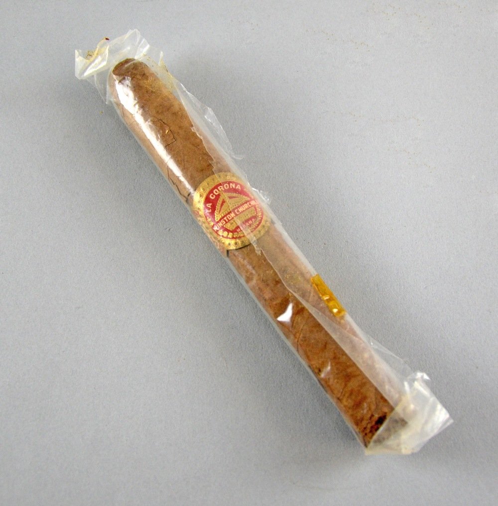 Sir Winston Churchill, an unsmoked cigar given by: Sir Winston Churchill, an unsmoked cigar given by Churchill with original band, "La Corona Winston Churchill Habana" Provenance: Consigned by the family of Guy Holland. Guy was stage director in the L