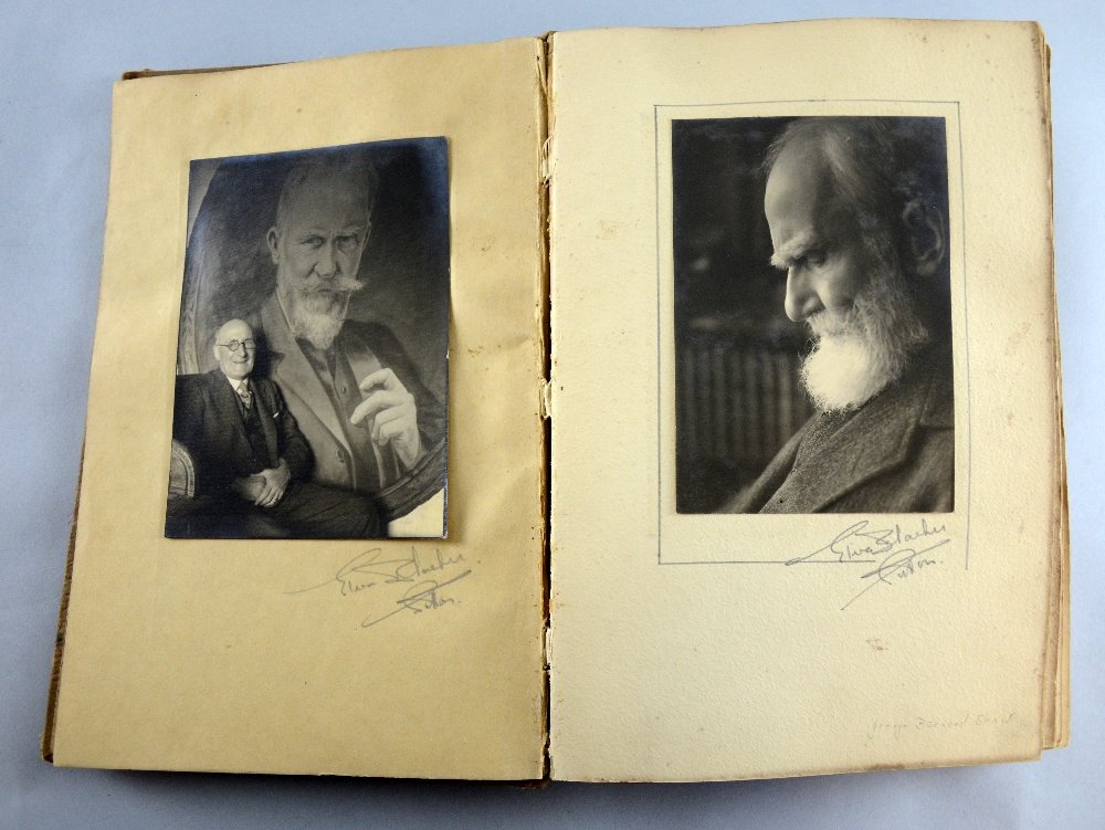 An early 20th century photo album containing many: An early 20th century photo album containing many photographs of famous names including George Bernard Shaw, Robertson Hare, Arnesby Brown & others signed indistinctly, 110+