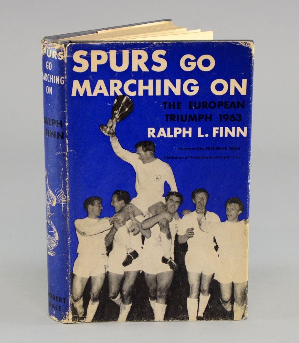 Spurs Go Marching On' First Edition book signed to the: Spurs Go Marching On' First Edition book signed to the flyleaf by the Tottenham Hotspur footballer John White (1937-64) Provenance: This book was given as a present by John White to Judith Harris who