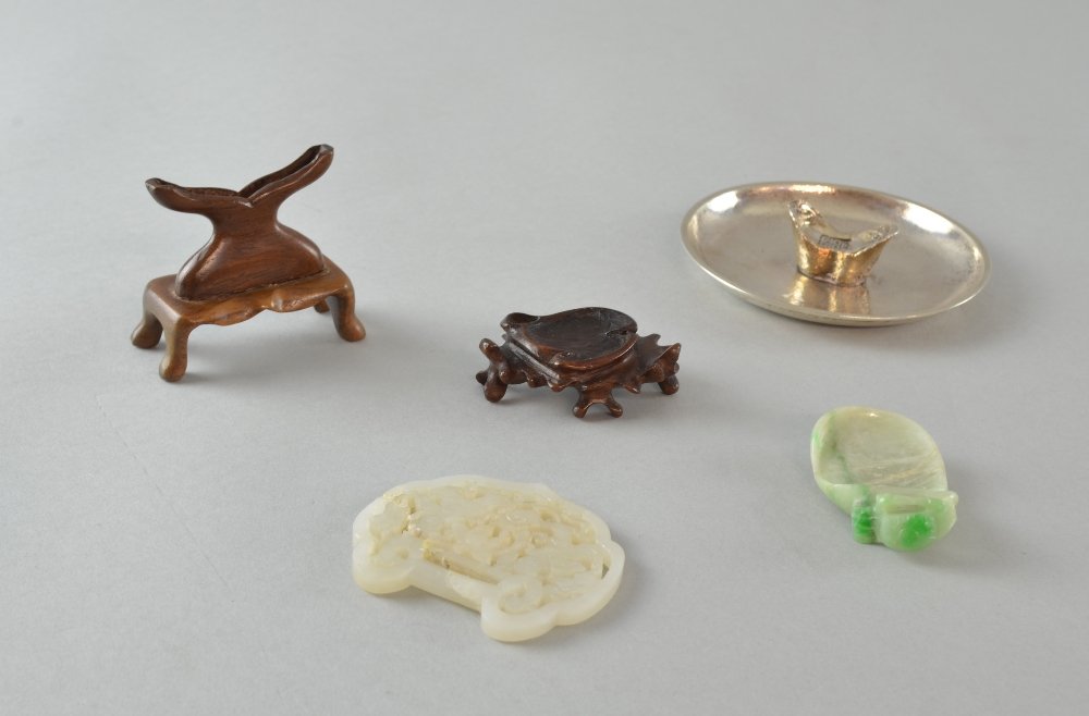Chinese silver boat ingot mounted as an ashtray,: Chinese silver boat ingot mounted as an ashtray, Chinese nephrite jade buckle, and a small jadeite brush washer,