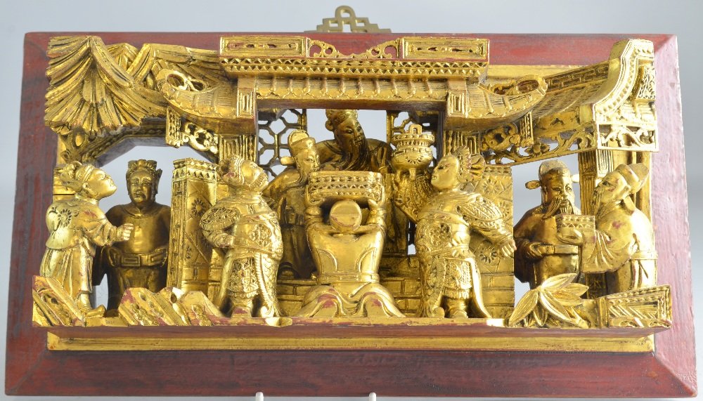 Chinese carved gilt wood panel of figures by an altar,: Chinese carved gilt wood panel of figures by an altar, 8 x 14in. (20 x 36cm)