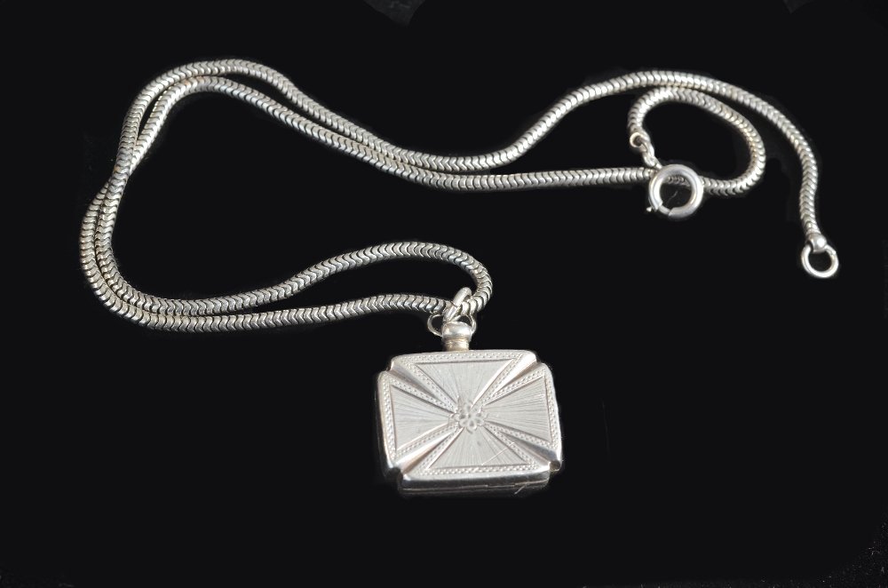 George IV silver vinaigrette on silver plated chain, of: George IV silver vinaigrette on silver plated chain, of Maltese cross form, with pierced floral decorated grille, by Joseph Willmore, Birmingham, 1821.