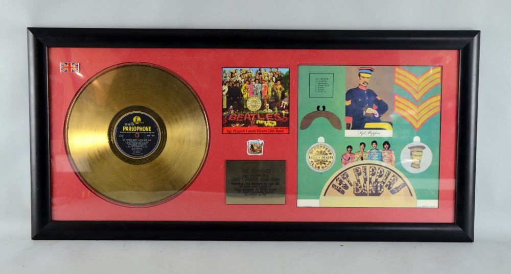 The Beatles Sgt. Pepper's Lonely Hearts Club Band 24ct: The Beatles Sgt. Pepper's Lonely Hearts Club Band 24ct gold plated LP with cover deisgned by Peter Blake, CD cover signed by Peter Blake, framed 14 x 34in. (36 x 86cm)