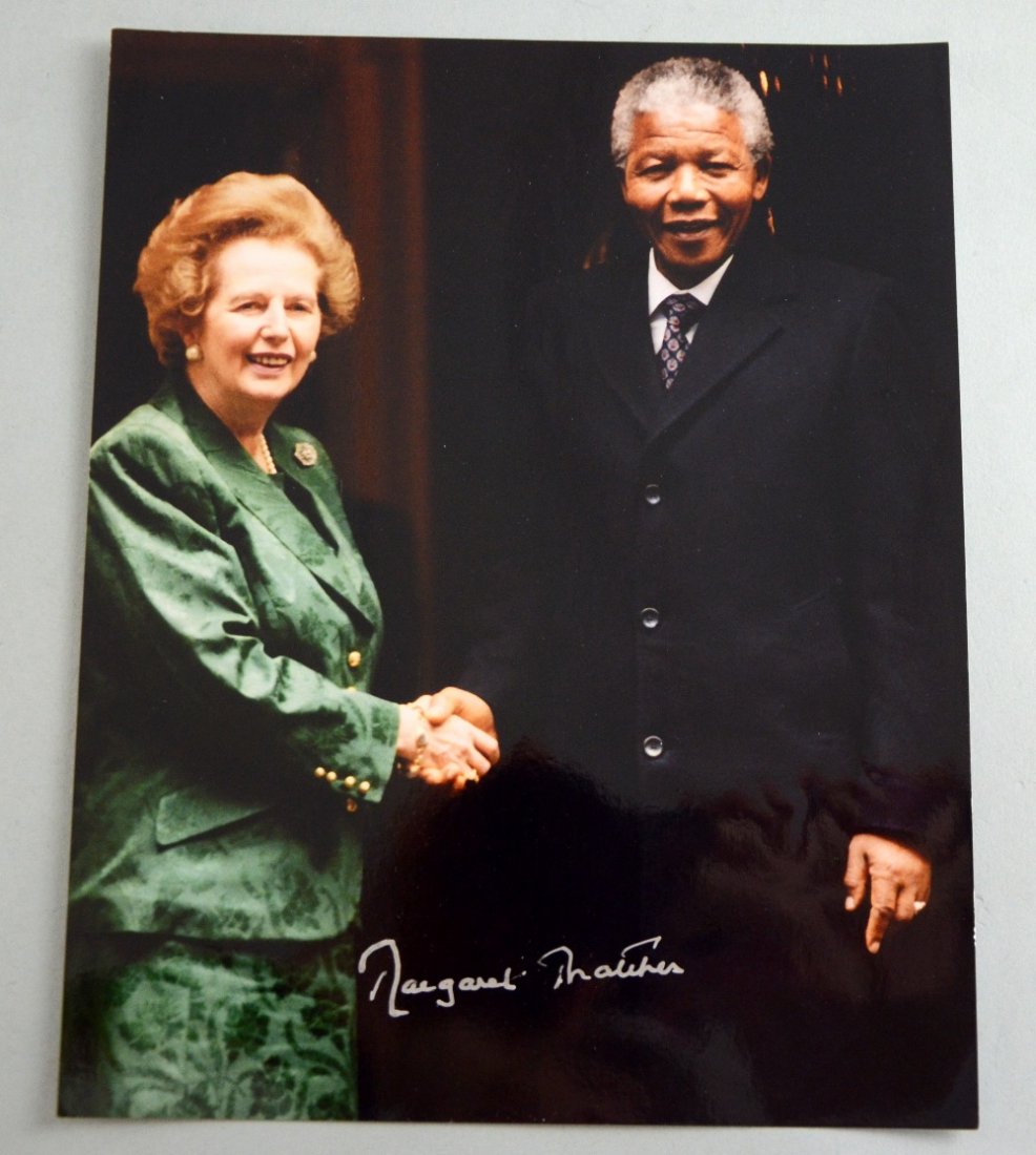 Margaret Thatcher (1925-2013) British Prime Minister: Margaret Thatcher (1925-2013) British Prime Minister 1979-90, a signed 10x8 photograph of Thatcher & Nelson Mandela at 10 Downing Street, signed in gold pen to lower darker section 10 x 8in. (25 x 20c
