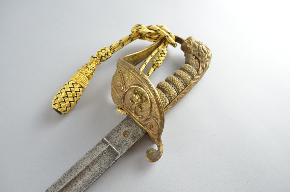 Naval officer's dress sword with gilt metal lion's head: Naval officer's dress sword with gilt metal lion's head pommel, shagreen and wire grip, lacking shell guard and scabbard,