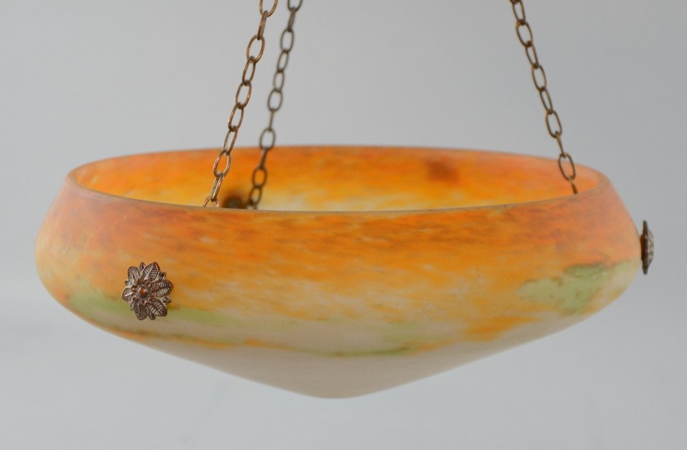 An early 20th C glass ceiling light shade by Muller: An early 20th C glass ceiling light shade by Muller Freres, France shades of amber and green, with copper and brass fittings, 38 cm diameter
