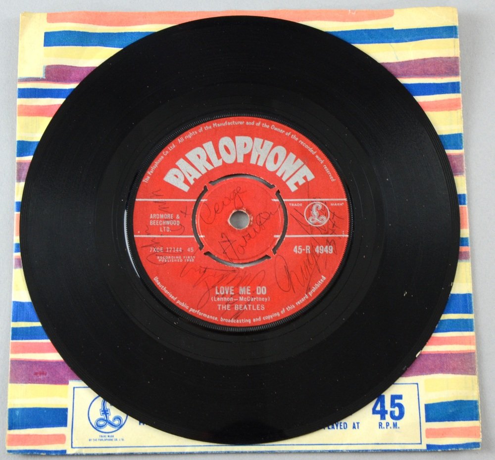 The Beatles Love Me Do (Parlophone, 1962) 45-R 4949: The Beatles Love Me Do (Parlophone, 1962) 45-R 4949 7inch single, signed to central section by Paul McCartney, John Lennon, George Harrison & Ringo Star, in original sleeve Provenance: Consigned as pa