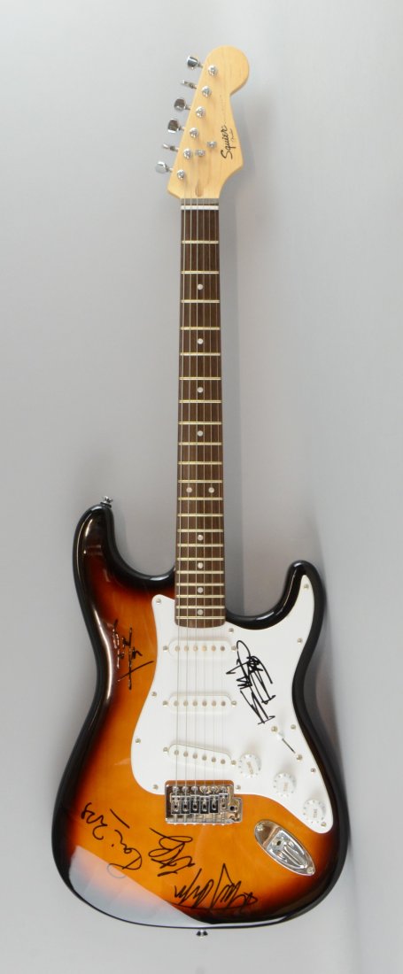 Rolling Stones, Fender Squier electric guitar signed: Rolling Stones, Fender Squier electric guitar signed recently by five members of the Stones to front in black marker including Ronnie Wood, Mick Jagger, Bill Wyman, Charlie Watts & Keith Richards Prov