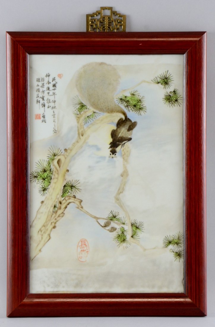 20th century Chinese porcelain plaque painted with a: 20th century Chinese porcelain plaque painted with a squirrel on a branch and calligraphy, typed label verso reading 'Squirrel 1933, purchased in Beijing April 1996', 15 x 9in. (38 x 23cm)