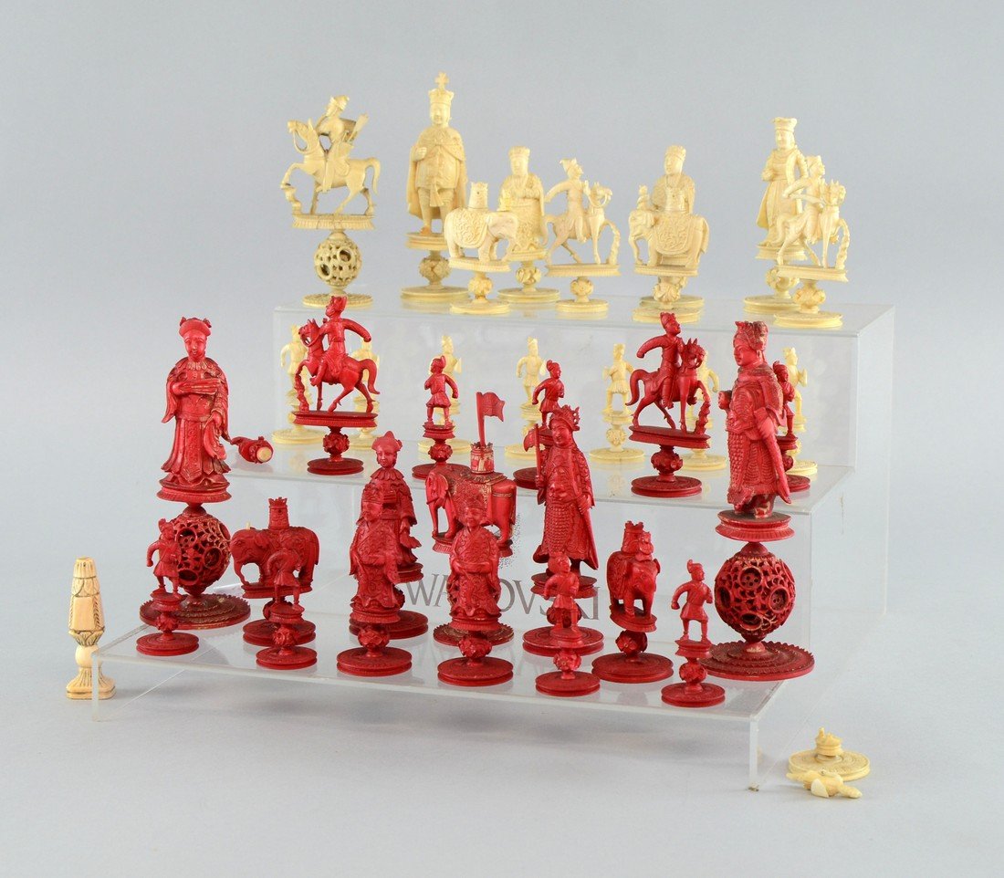 19th/20th century mixed red and white carved Chinese: 19th/20th century mixed red and white carved Chinese ivory chess sets,