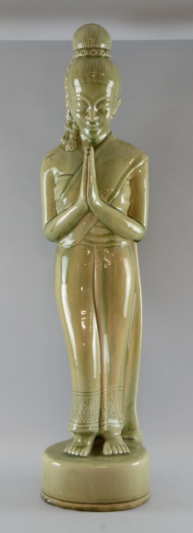 Modern Vietnamese celadon pottery figure of a standing: Modern Vietnamese celadon pottery figure of a standing woman with hands together, 36in. (91cm)