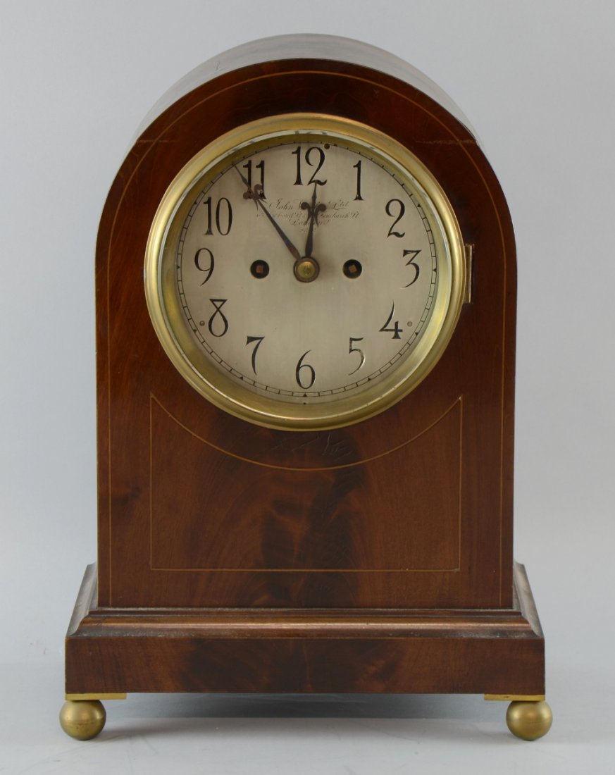 Late 19th century early 20th century Double fusee: Late 19th century early 20th century Double fusee mantel clock by John Walker New Bond Street London silver dial inscribed and no. 8212, to twin train movement with matching number and inscription 38
