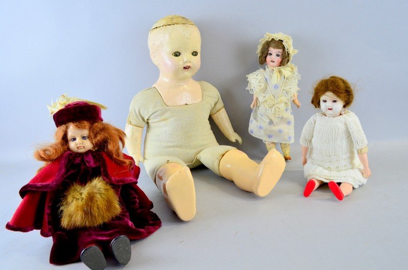 Early 20th century doll by Effanbee, 50cm, and three: Early 20th century doll by Effanbee, 50cm, and three others,