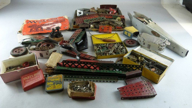 Box of old Meccano to include models built with set No.: Box of old Meccano to include models built with set No. 45, Erector model plane, New Erector includes rubber tyres and instruction manuals,