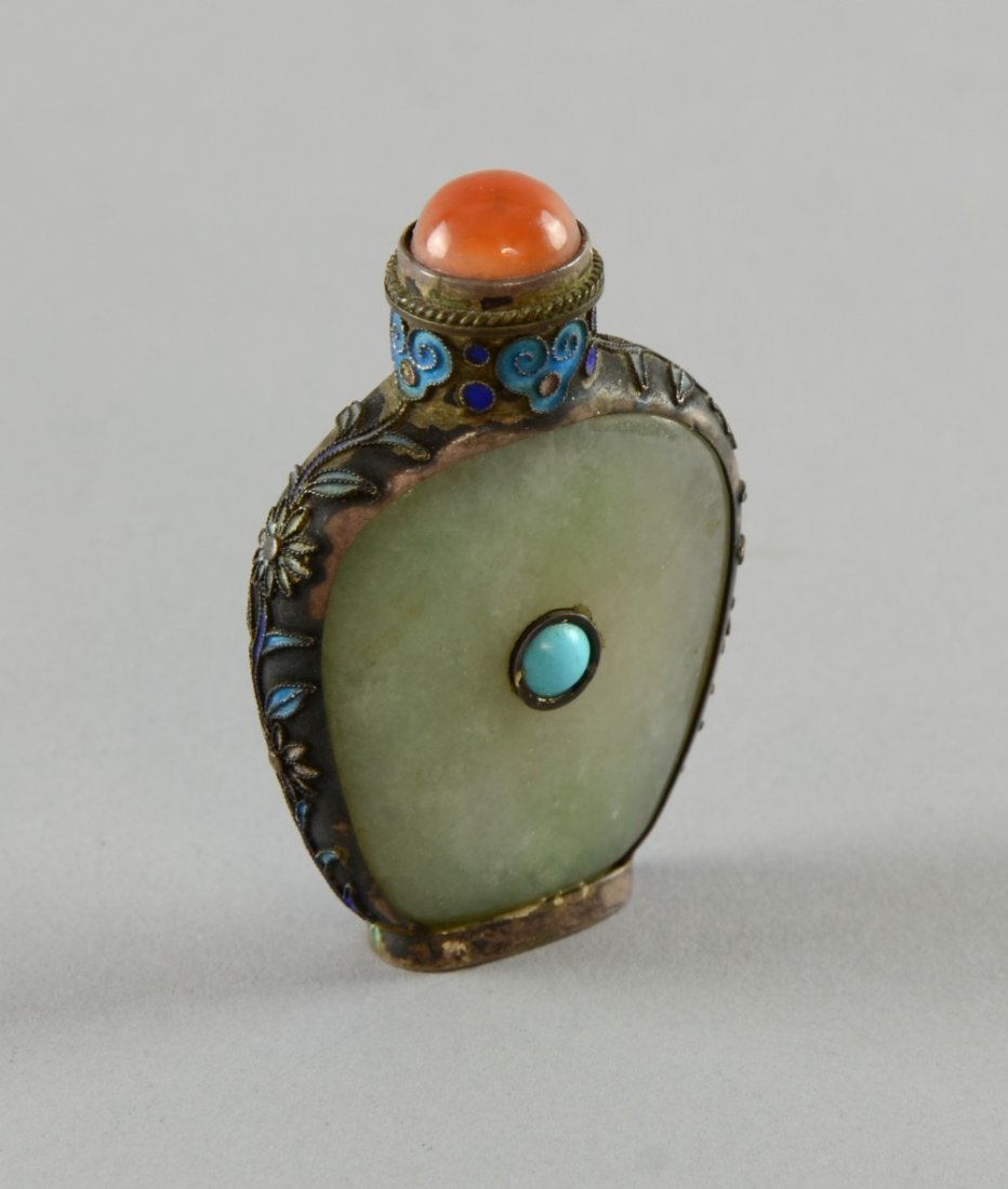 Chinese jade snuff bottle of flattened shield shape (1 of 1)