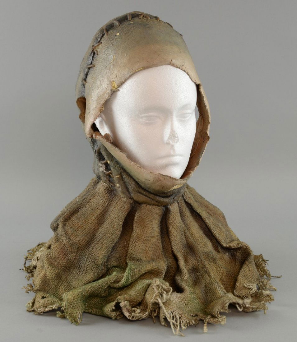 Wicked The Musical (2003) - A Scarecrow cowl made from: Wicked The Musical (2003) - A Scarecrow cowl made from latex & material from the hit West End musical based on the witches from The Wizard of Oz, with bust marked Mark Evans.