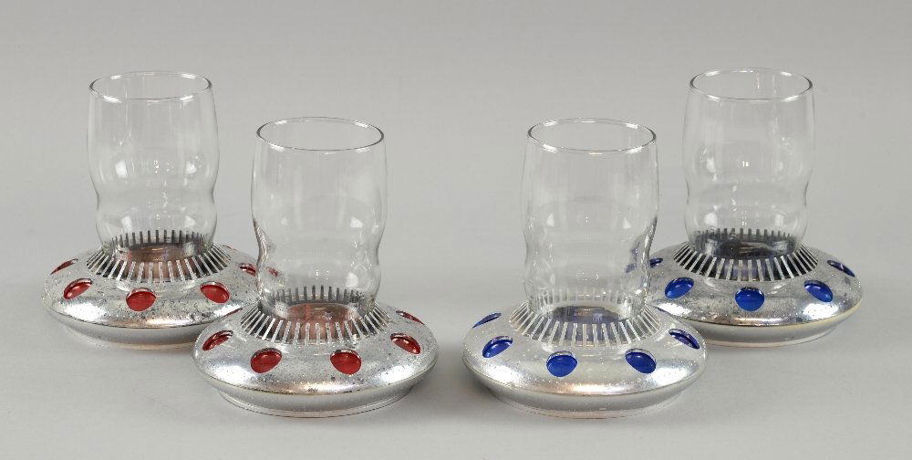 Mars Attacks! - Four glass tumblers with customised: Mars Attacks! - Four glass tumblers with customised holders bought from a Warner Brothers clearance auction and believed to have been crew gifts for working on the film, with certificate from Warner B
