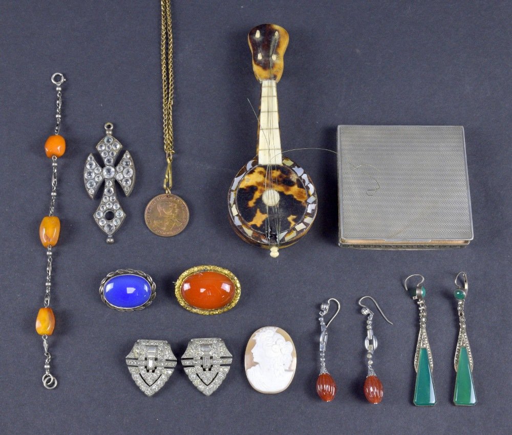 Group of paste and costume jewellery, in: Group of paste and costume jewellery, including carnelian and paste set earrings, paste set cross, cameo, silver compact and other items