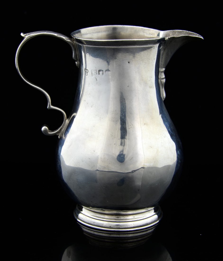 Edward VII silver cream jug by Charles S: Edward VII silver cream jug by Charles Stuart Harris, London, (date letter rubbed), 9.5 cms high, 95 grams