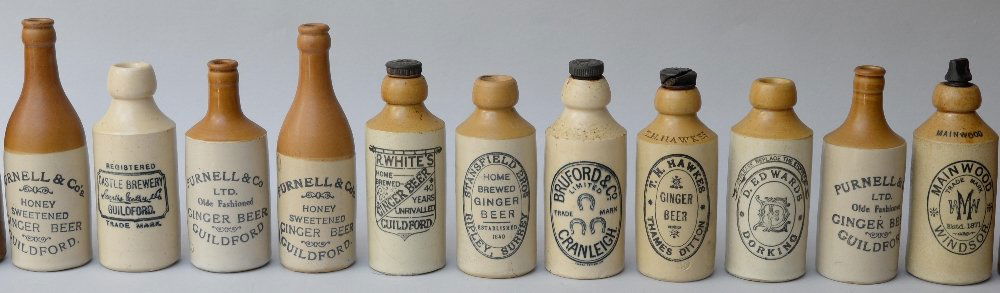 Collection of eleven stoneware ginger beer bottles (1 of 1)
