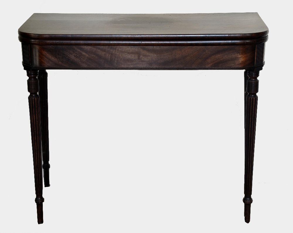 Pair of 19th century mahogany fold-over tea tables: Pair of 19th century mahogany fold-over tea tables on turned and reeded supports, 74cm x 92cm x 45cm,