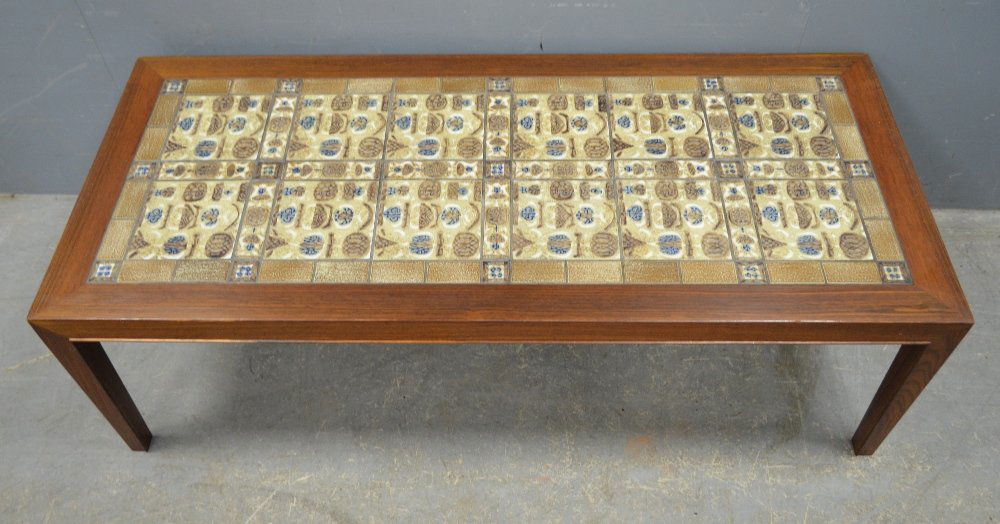 Haslev Mobelsnedkeri, Danish rosewood coffee table: Haslev Mobelsnedkeri, Danish rosewood coffee table inset with Royal Copenhagen tiles. 40 x 127 x 56cm