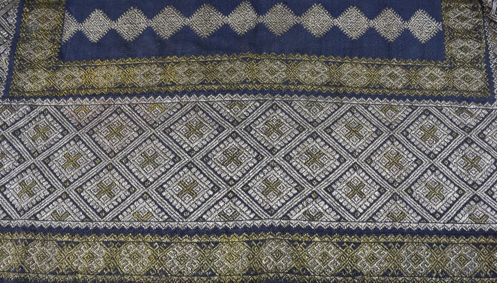 19th Century Romanian skirt panel, heavily embroidered: 19th Century Romanian skirt panel, heavily embroidered in two tone gold thread, design of diamonds with crosses to the centre. 85 cm x 144 cm.Provenance: An important collection of International Histo