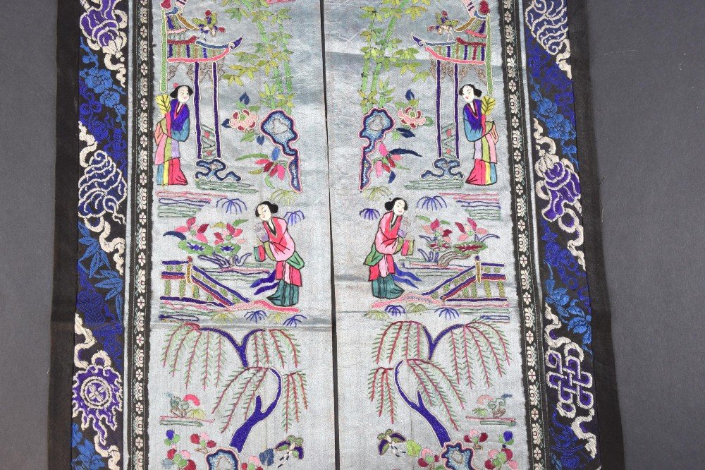 A pair  Chinese, Qing  sleeve panels each depicting two (1 of 2)