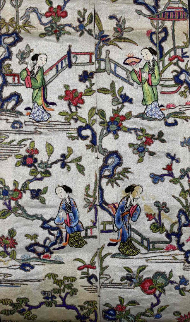 A pair of Chinese sleeve panels, finely worked in (1 of 2)