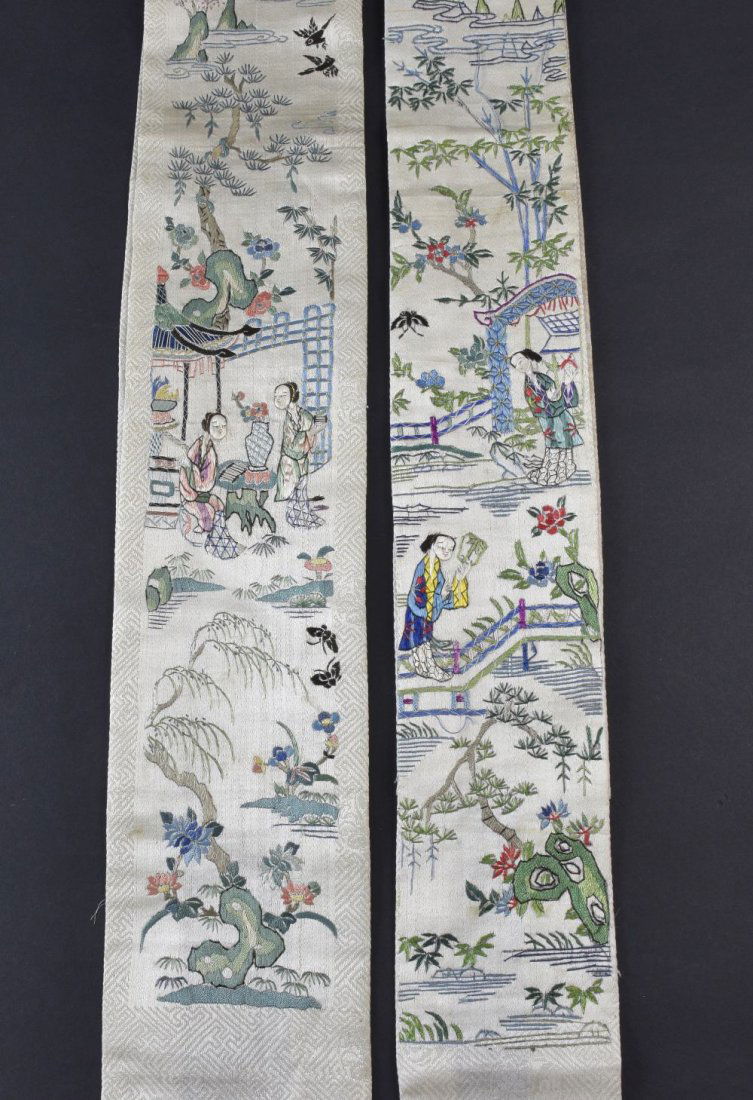 A pair of Chinese sleeve panels embroidered on cream (1 of 2)
