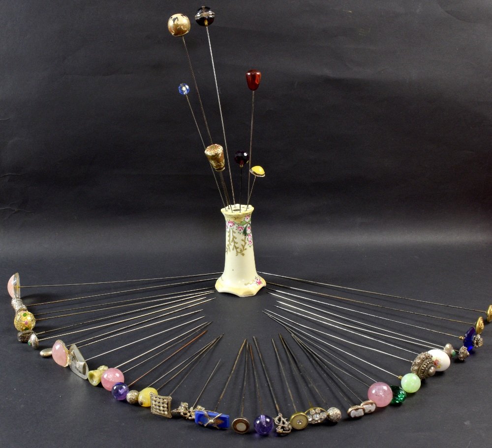 A small collection of assorted hat pins including (1 of 1)