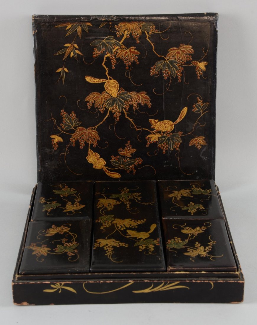 19th century Japanese lacquered box decorated with (1 of 1)