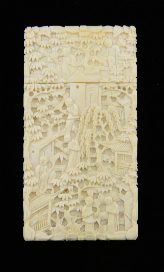 Chinese ivory card case carved with figures on a (1 of 2)