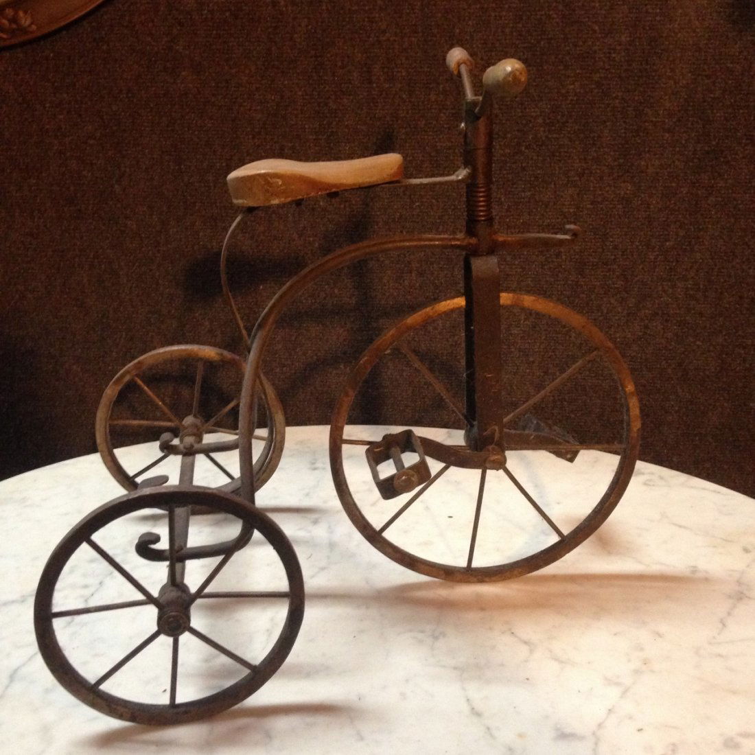Functional Toy Doll Cast Iron Tricycle Vintage: Looks handmade, has wooden seat and functional handlebars and wheels 15"x11"