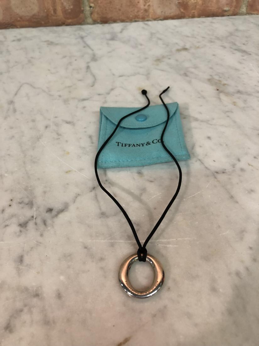 Tiffany & Co. Necklace "Elsa Peretti" Sevillana Pendant: 1" diameter Elsa Peretti Necklace marked "Tiffany & Co. .925 Spain", wear appropriate for age. Sterling