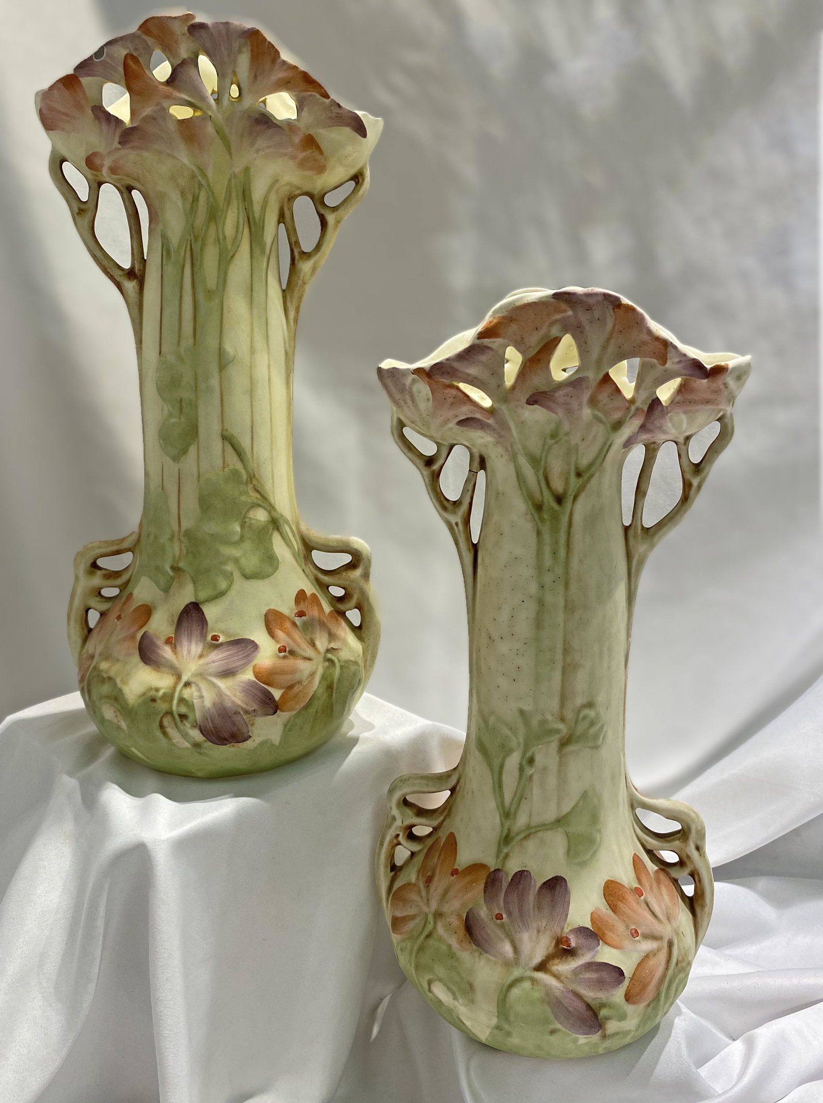 Pair Art Nouveau Austrian Pottery Vases: 12 inches tall as is with a crack on one and a chip on another