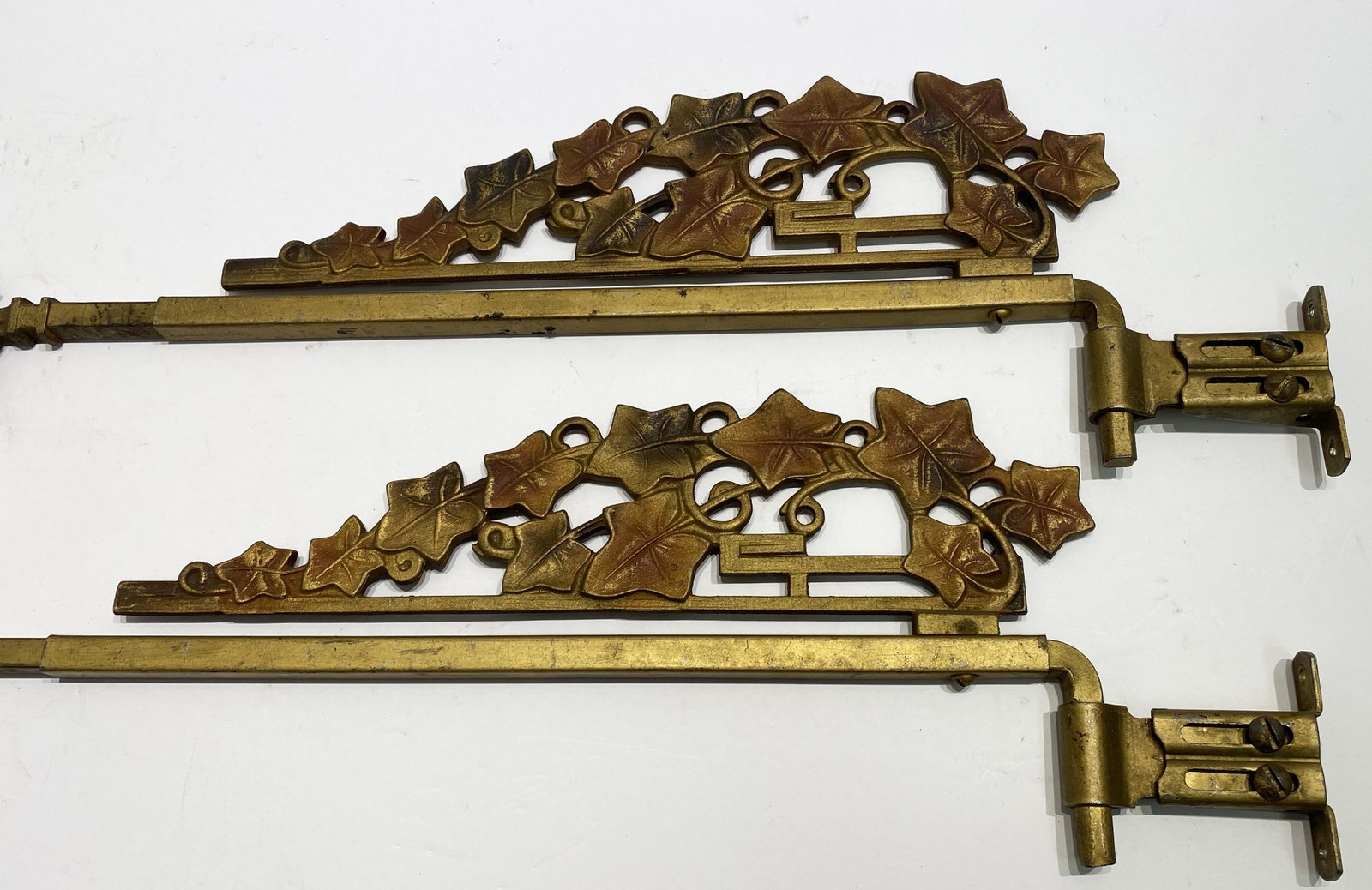 Pair 1920's Leaf Pattern Curtain Tie Back Swing Rods: 17.5 in long by 3.75 in deep