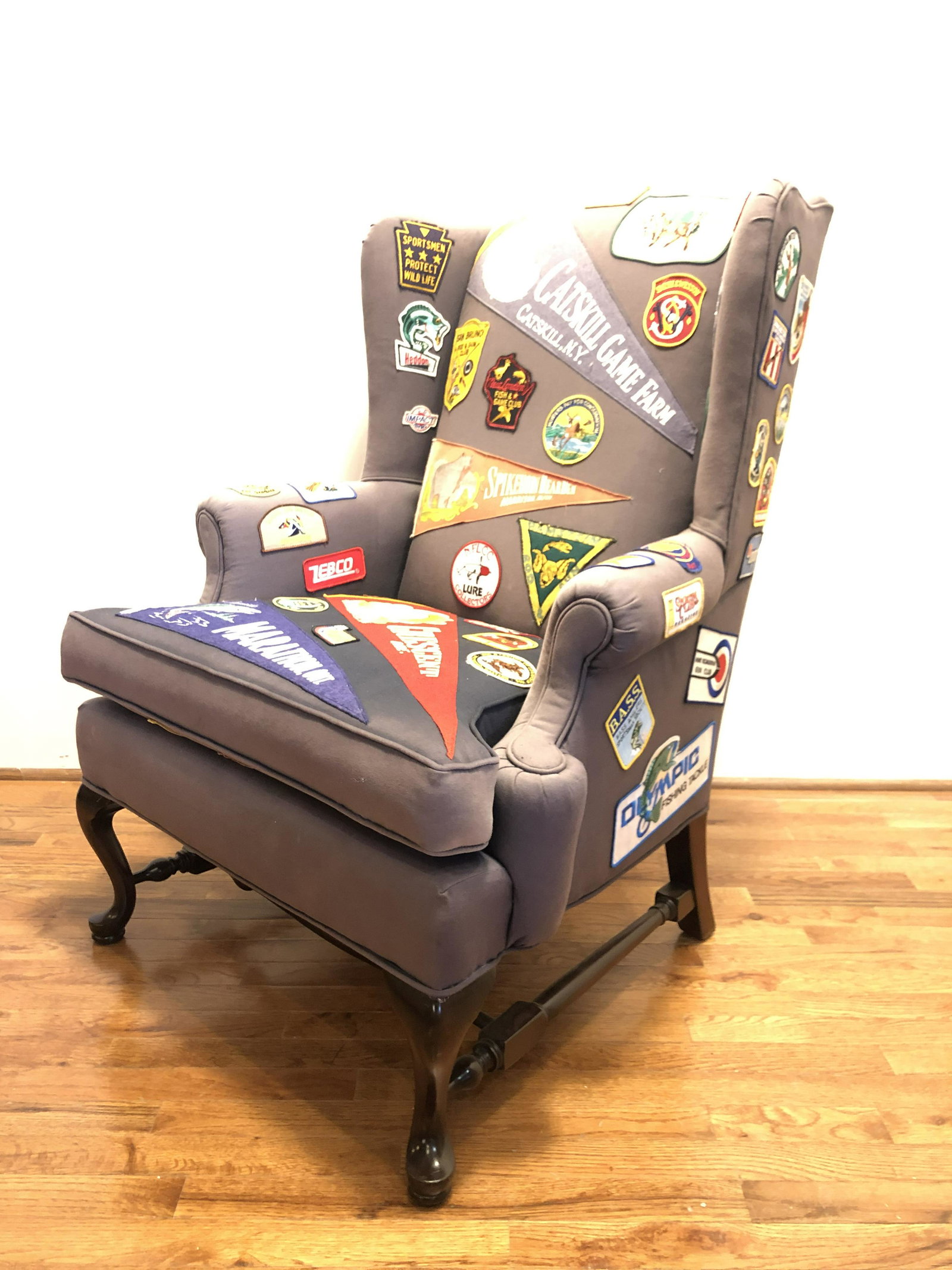 Wing Back Chair from Gov Jim Thompson's MIch Estate: 43.5 in tall to bak 20 in to seat 32 in across sunfaded fabric