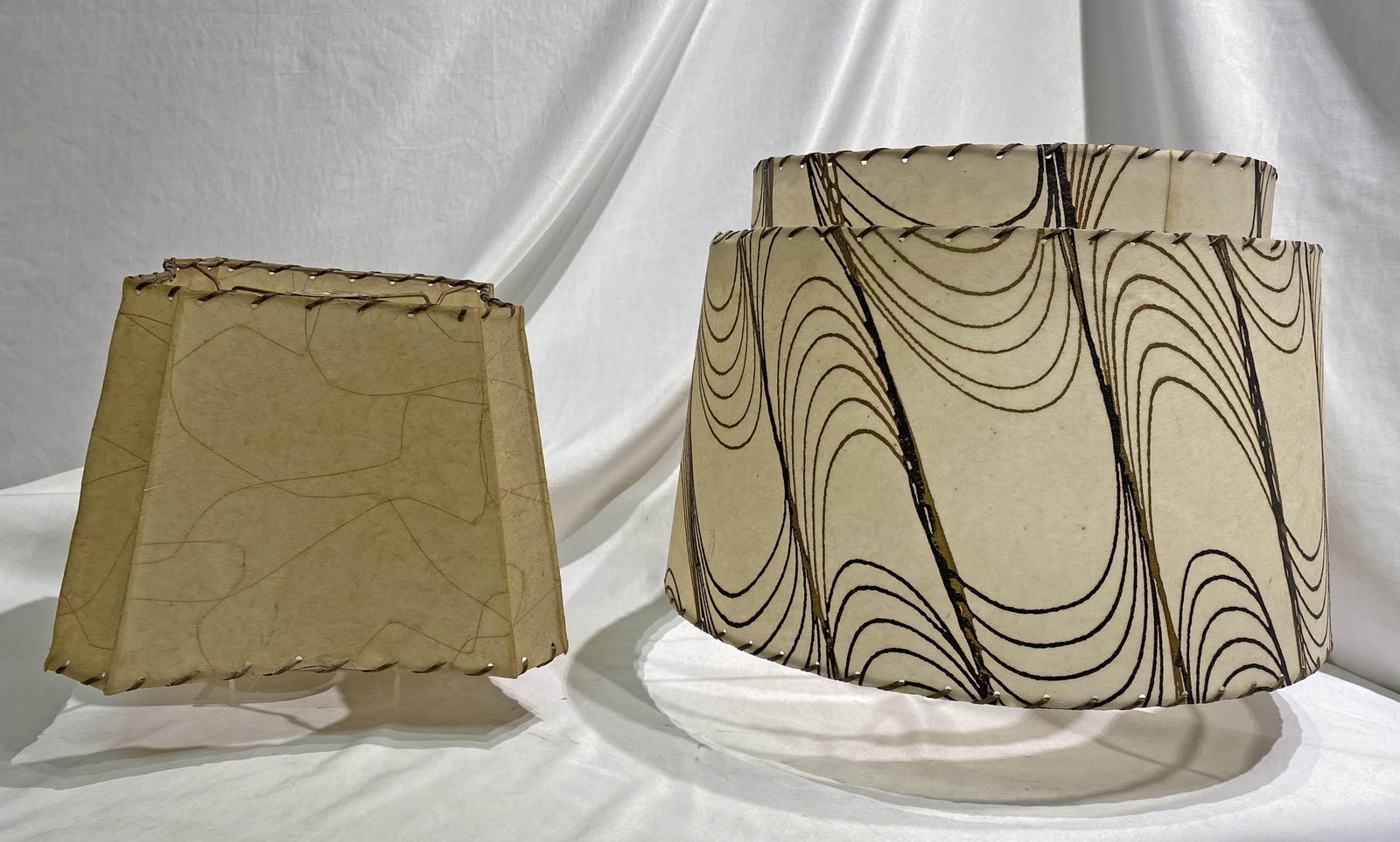 2 Mid Century Fiberglass Whipstitch Shades: 14 in diameter 12 in high and 8in wide by 7.5 in high