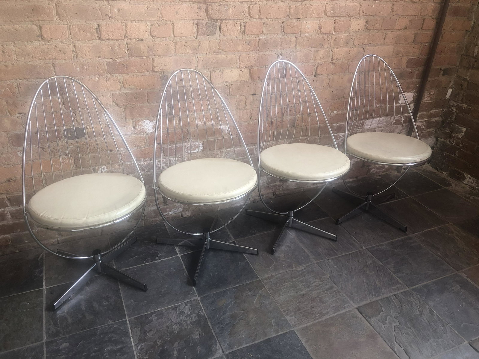 Dahlens Dalum Chrome Swivel Dining Chairs Set of 4: no cushions, 34 in tall to back, 18 in floor to seat, 18 in depth seat and width