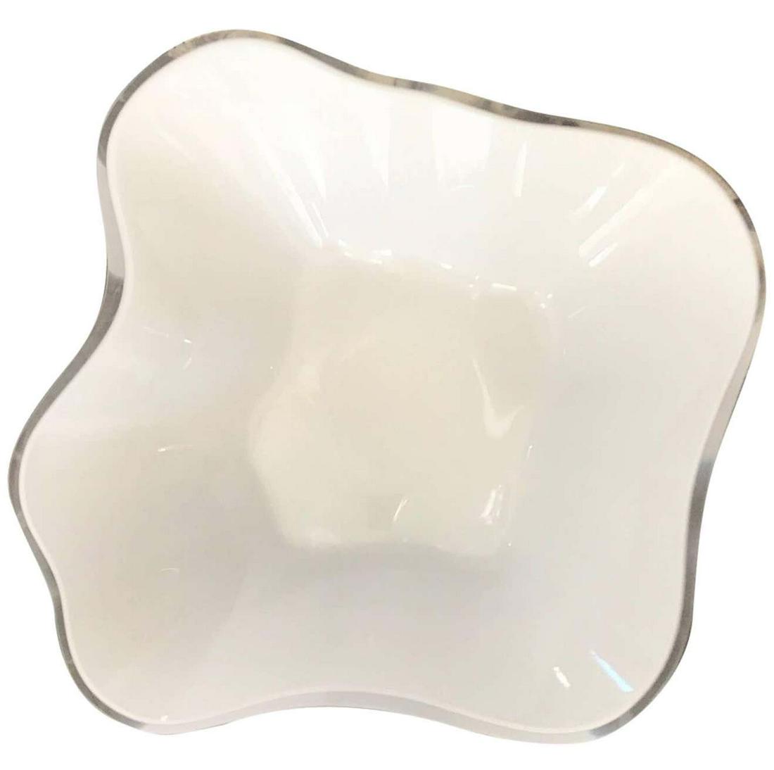 Alvar Aalto Cased White Glass Centerpiece Bowl: A rare Alvar Aalto organic model #9767 glass dish. Aalto designed the decorative centerpiece for the Karhula Glassworks in Finland. The bowl is stamped Alvar Aalto to the underside. The white glass is
